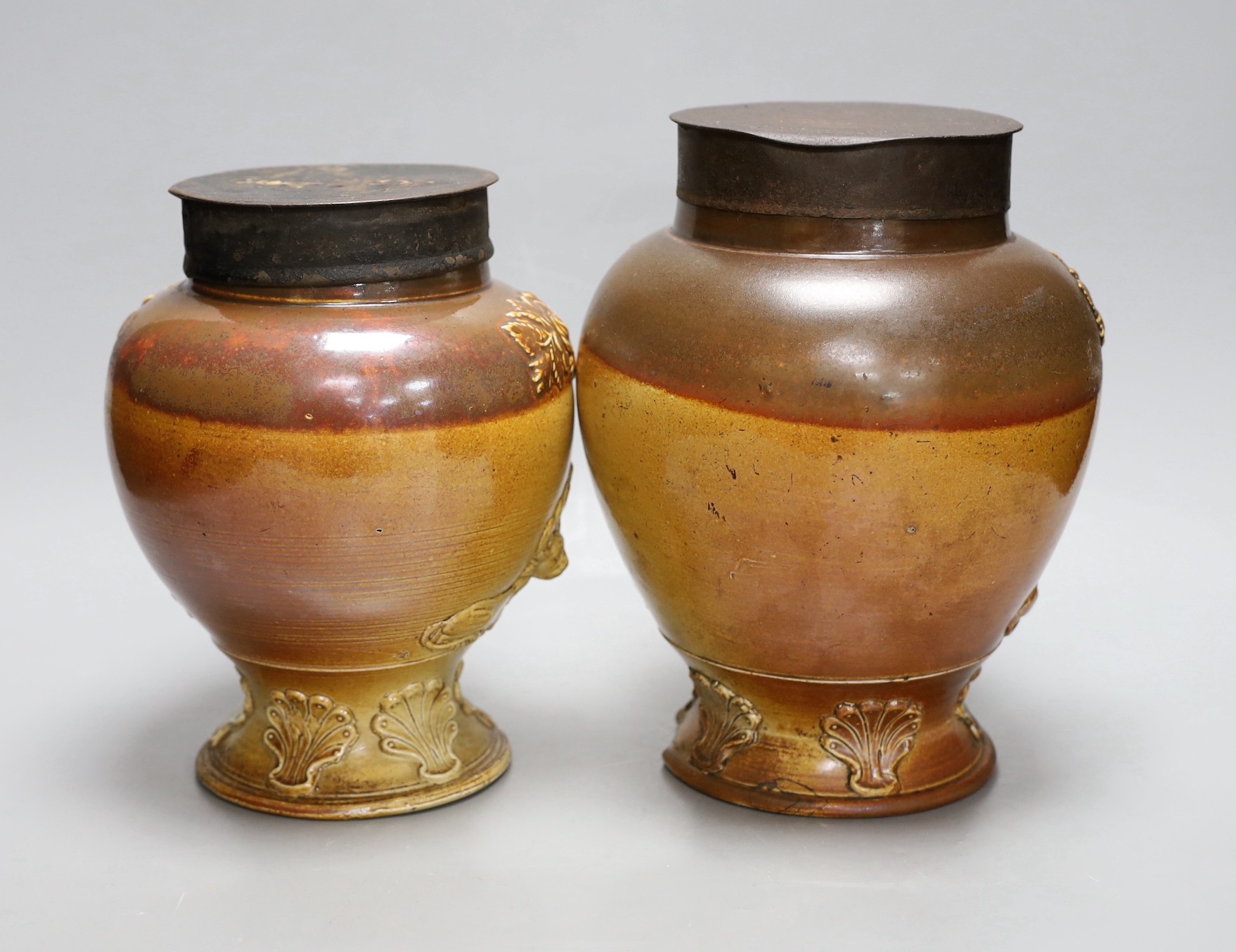 Two 19th century baluster shape salt glazed stoneware storage jars, each with Royal Coat of Arms sprigging, 24cm